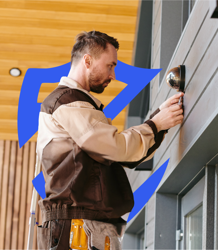 Security technician installing equipment.